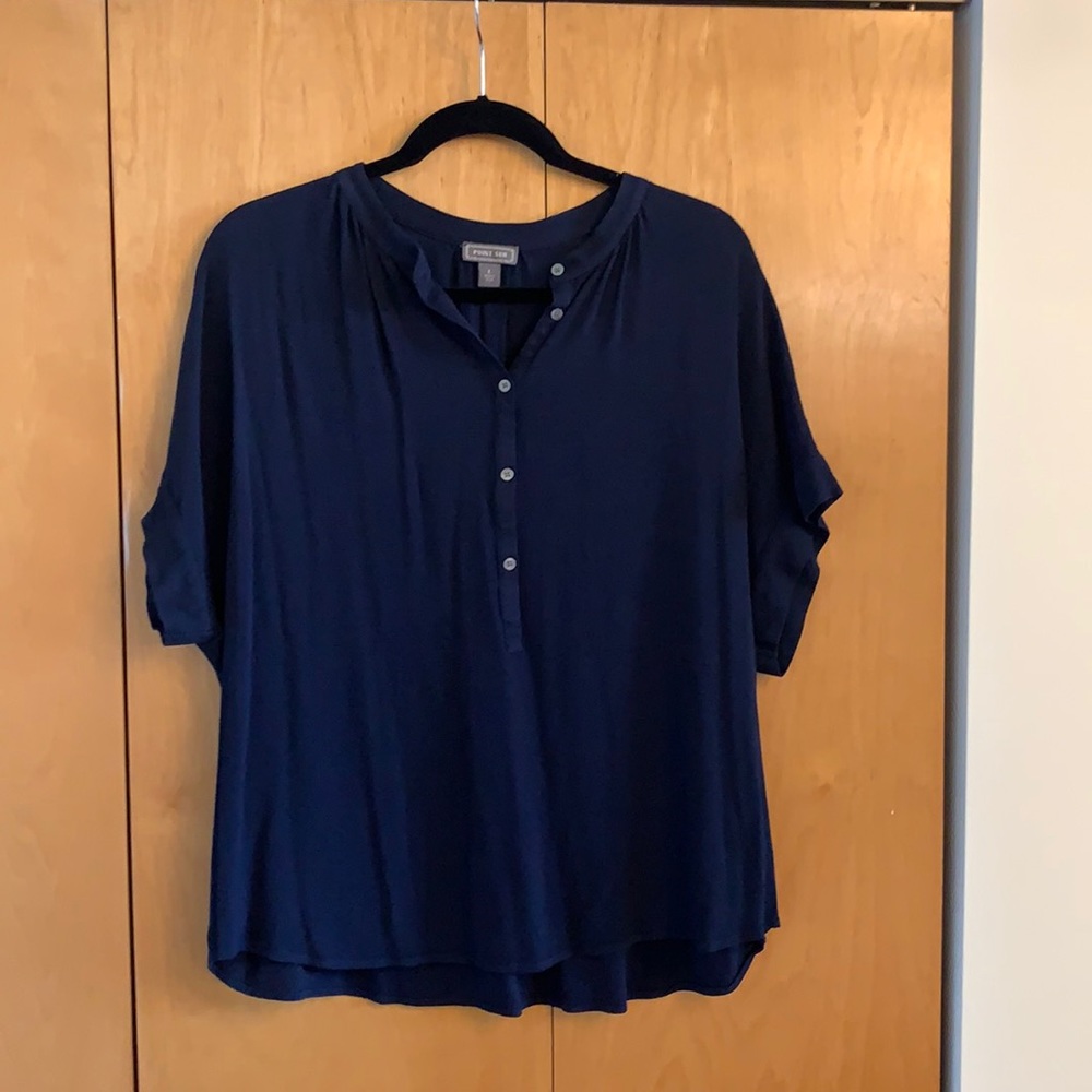 Navy half button blouse with cuff sleeve.